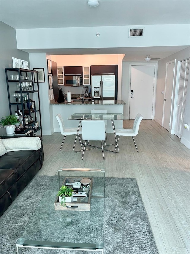 living room with hardwood / wood-style flooring