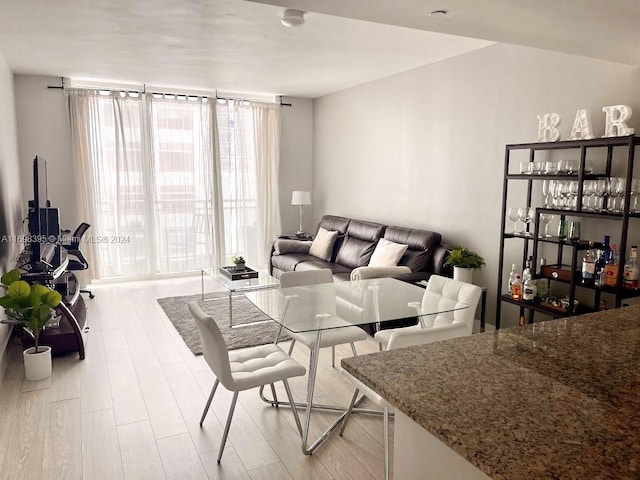 living room with light hardwood / wood-style flooring