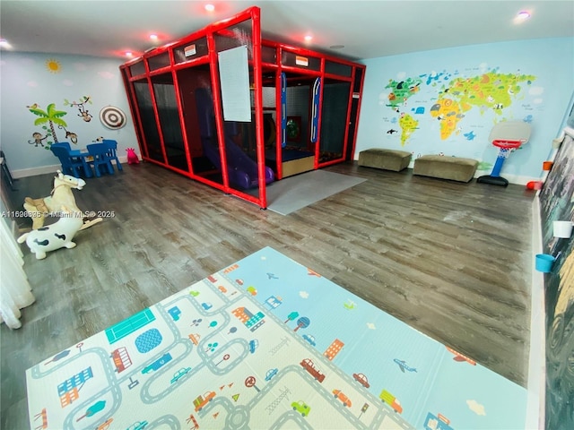 950 Brickell Bay Dr Unit 802, Miami, FL 33131 - game room featuring wood finished floors and recessed lighting