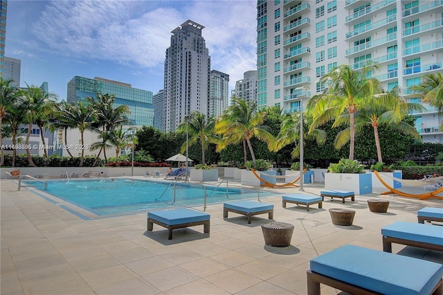950 Brickell Bay Dr Unit 802, Miami, FL 33131 - community pool with a view of city and a patio area