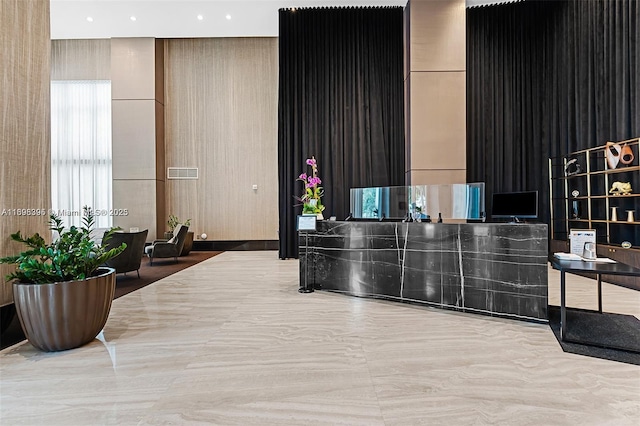 950 Brickell Bay Dr Unit 802, Miami, FL 33131 - reception area featuring a high ceiling and recessed lighting