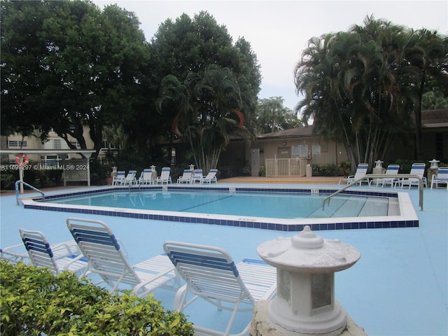 view of pool featuring a patio