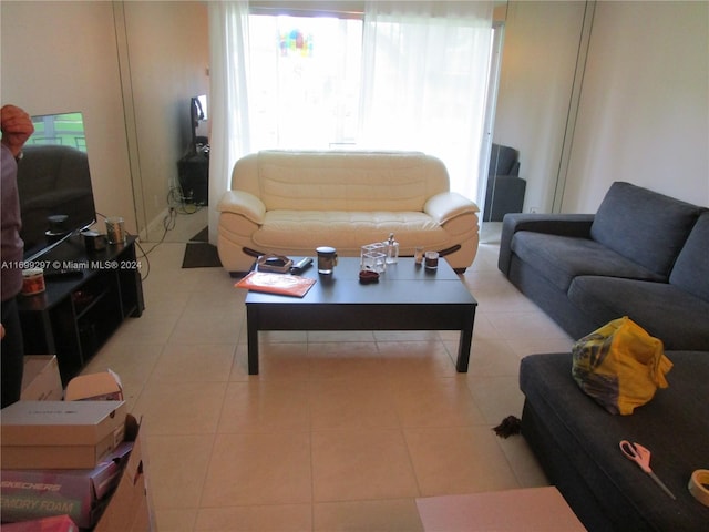 living room with light tile patterned floors