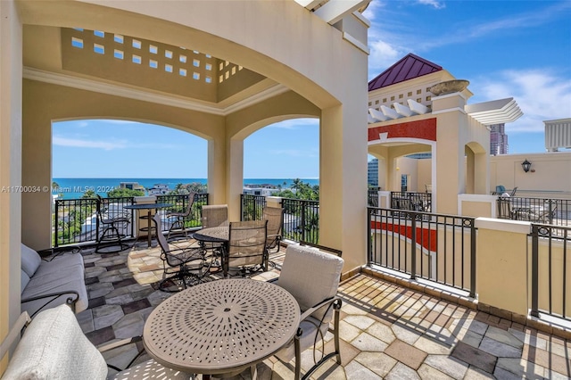 view of patio / terrace featuring a water view