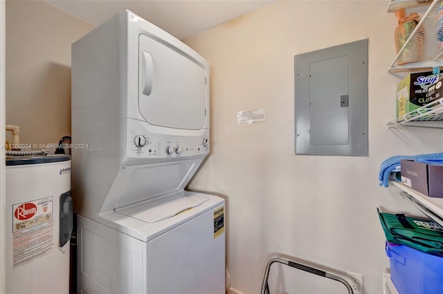 laundry area featuring stacked washing maching and dryer, electric water heater, and electric panel