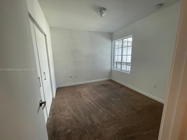 unfurnished bedroom with carpet floors