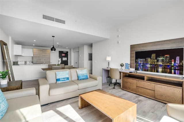 living room with light wood-type flooring