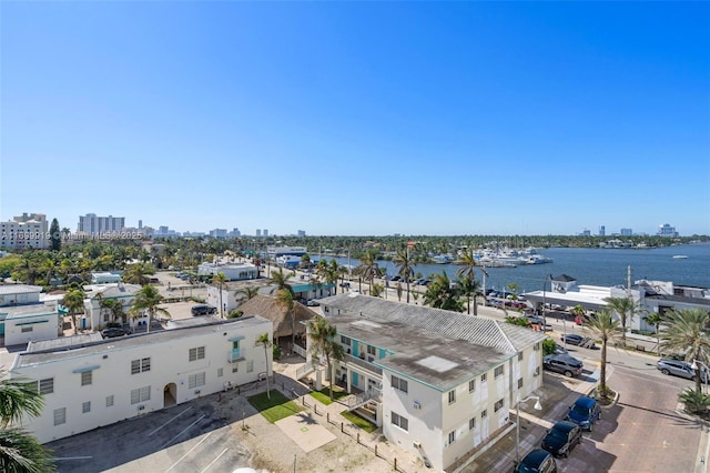 birds eye view of property featuring a water view