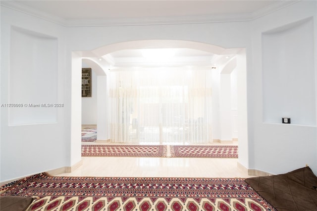 bathroom with wood-type flooring and ornamental molding