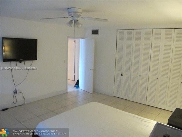 11960 NE 19th Dr Unit 24, North Miami, FL 33181 - tiled living area with a ceiling fan