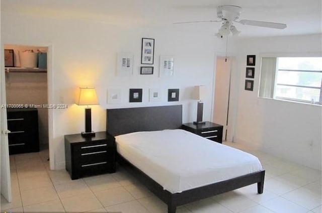 11960 NE 19th Dr Unit 24, North Miami, FL 33181 - bedroom featuring light tile patterned floors and ceiling fan