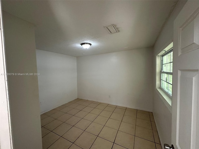 view of tiled empty room