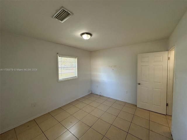 view of tiled empty room