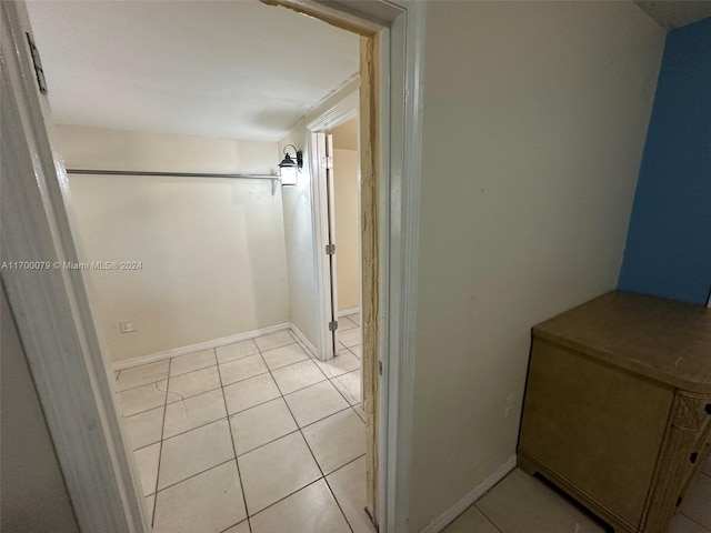 bathroom with tile patterned floors