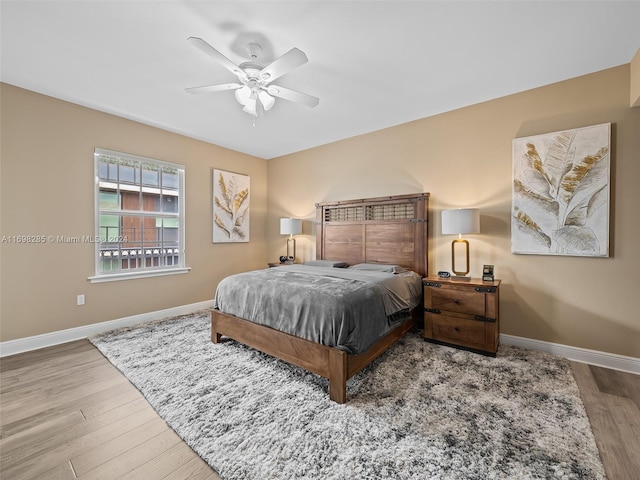 bedroom featuring ceiling fan and wood-type flooring