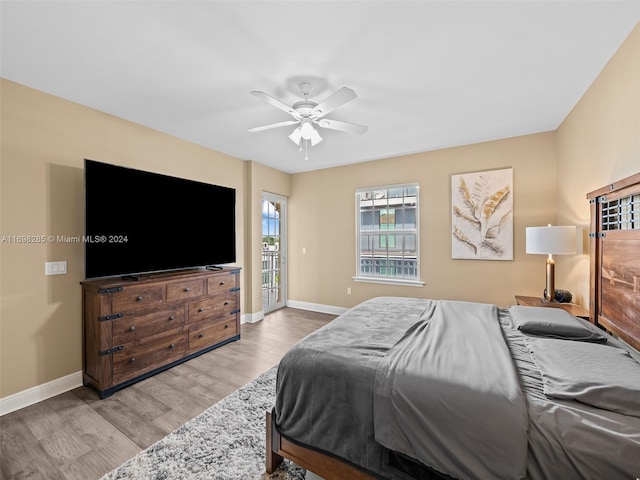 bedroom featuring ceiling fan and light wood-type flooring