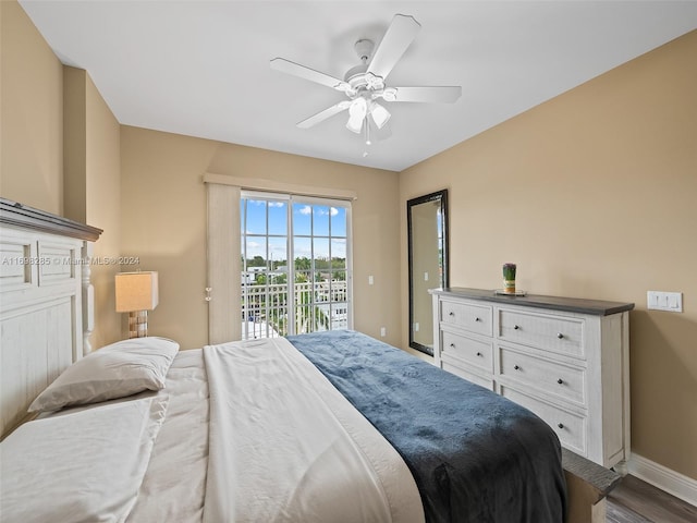 bedroom with access to outside, ceiling fan, and wood-type flooring