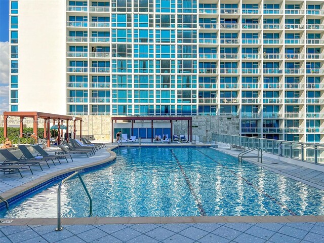 6799 Collins Ave Unit 1704, Miami Beach, FL 33141 - community pool featuring a patio area