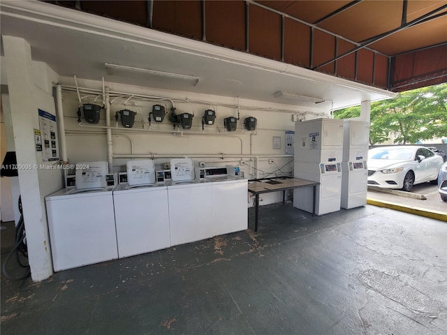 interior space featuring stacked washer / drying machine