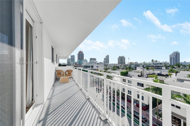 balcony featuring a city view