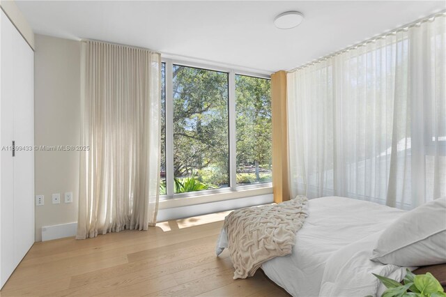 bedroom featuring wood finished floors