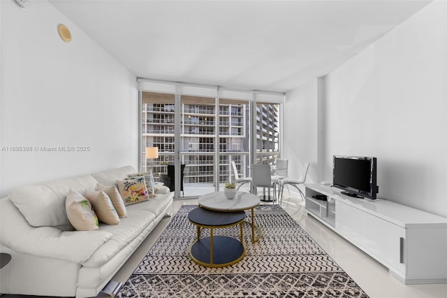 living room featuring floor to ceiling windows