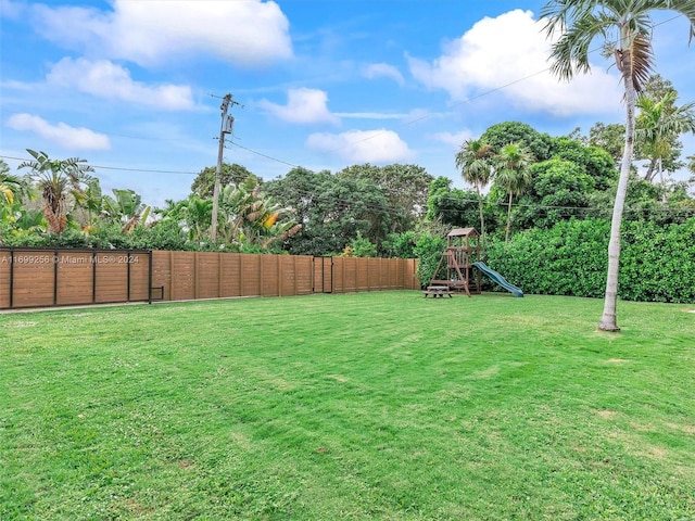 view of yard with a playground