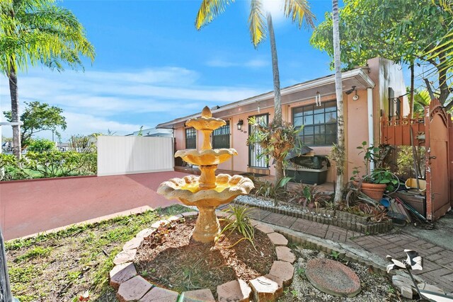 view of yard with a patio area and fence