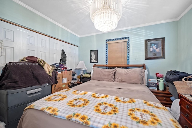 bedroom featuring a closet, an inviting chandelier, and ornamental molding