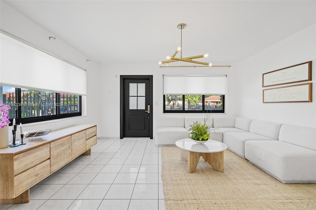 tiled living room with an inviting chandelier