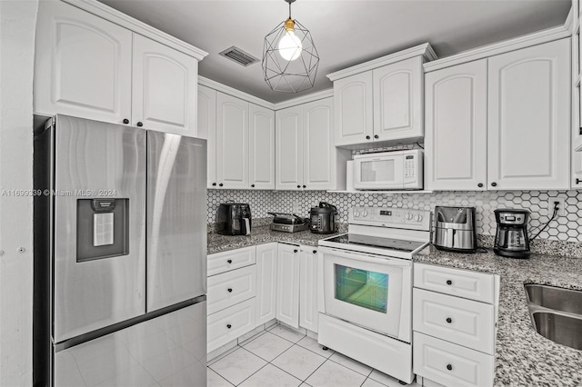 kitchen with white cabinetry, light stone counters, pendant lighting, white appliances, and decorative backsplash