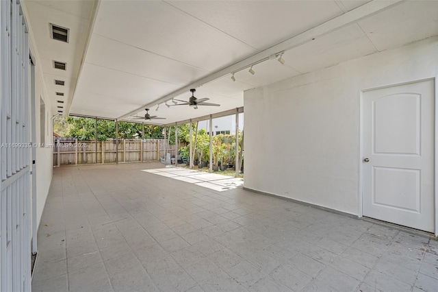 view of patio featuring ceiling fan