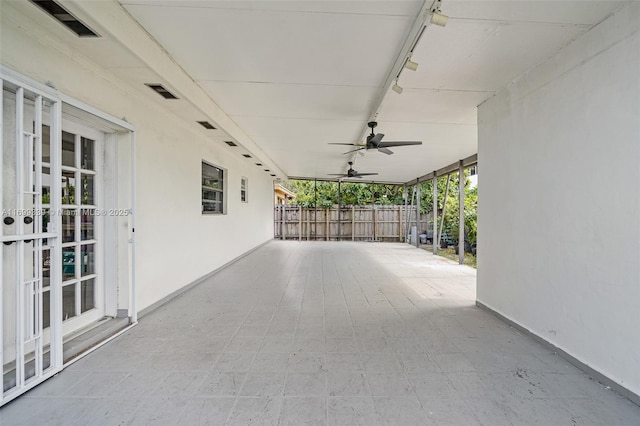 view of patio / terrace with ceiling fan and french doors