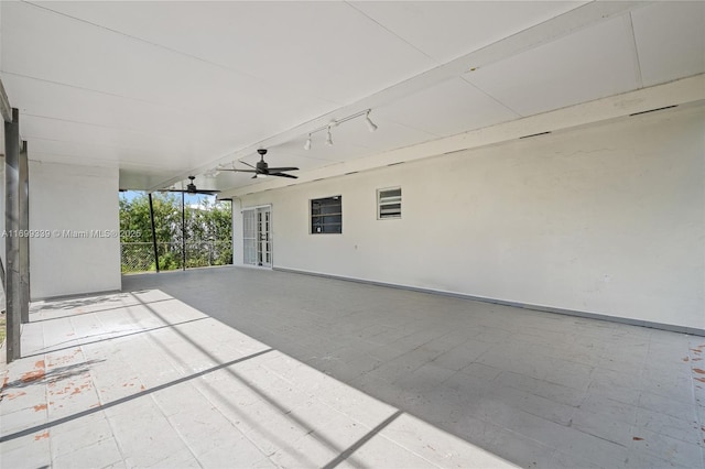 view of patio featuring ceiling fan