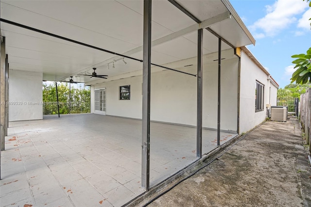 view of patio with ceiling fan, central air condition unit, and french doors