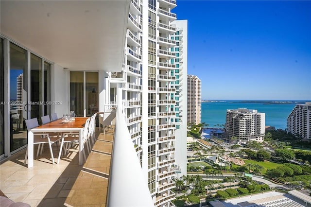 balcony featuring a water view