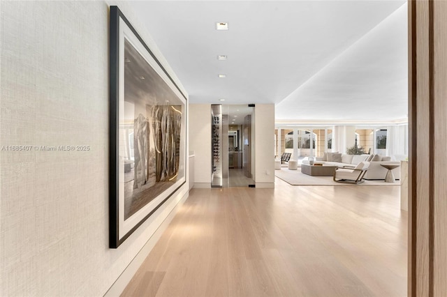 hall featuring light hardwood / wood-style flooring