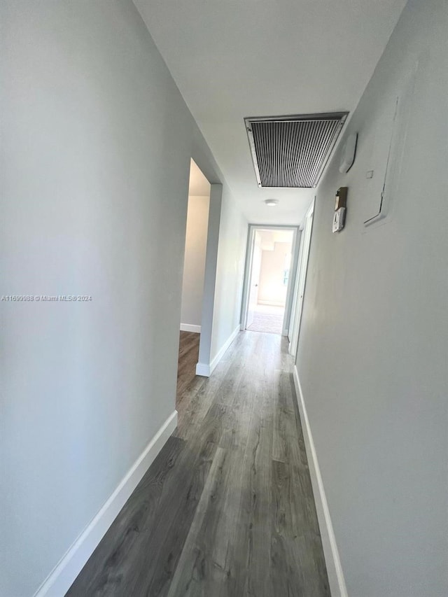 hall featuring dark wood-type flooring