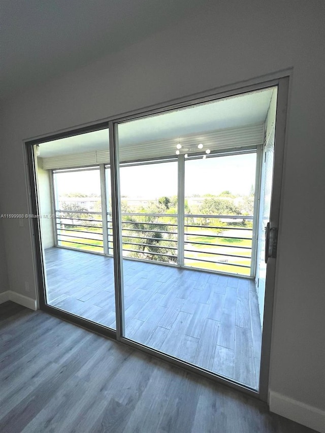 doorway featuring hardwood / wood-style floors