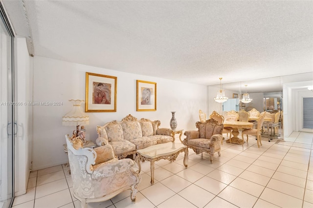 tiled living room featuring a textured ceiling