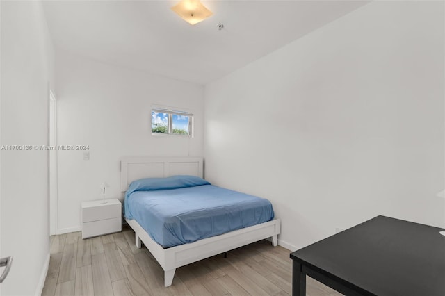 bedroom featuring light wood-type flooring