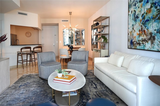 living room featuring an inviting chandelier