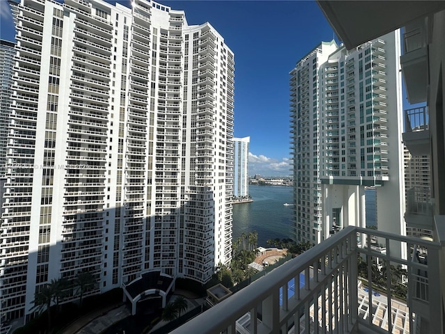 balcony featuring a water view