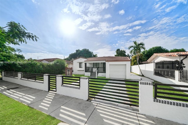 view of front of home with a garage