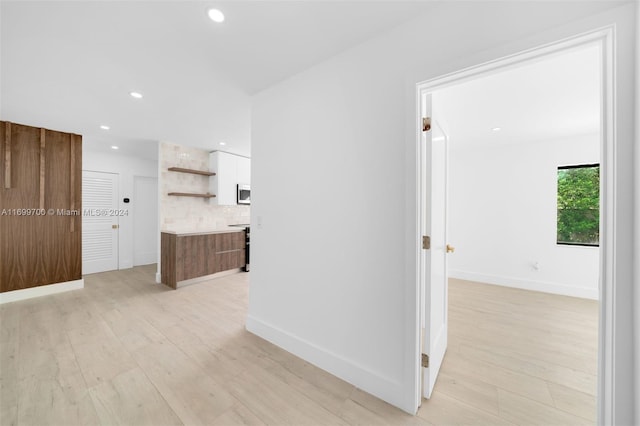 hall featuring light hardwood / wood-style flooring