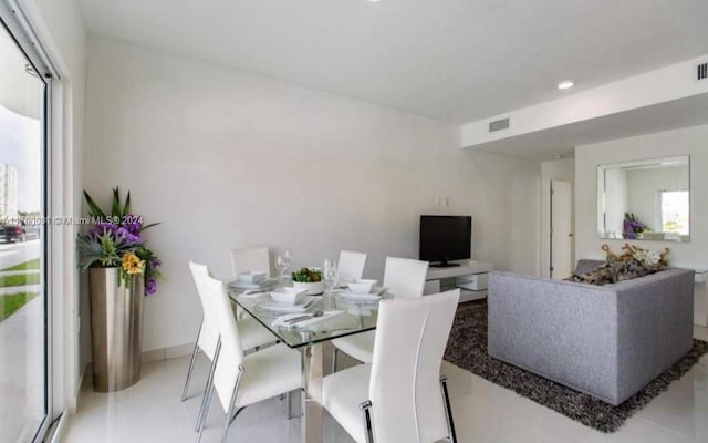 dining room featuring plenty of natural light