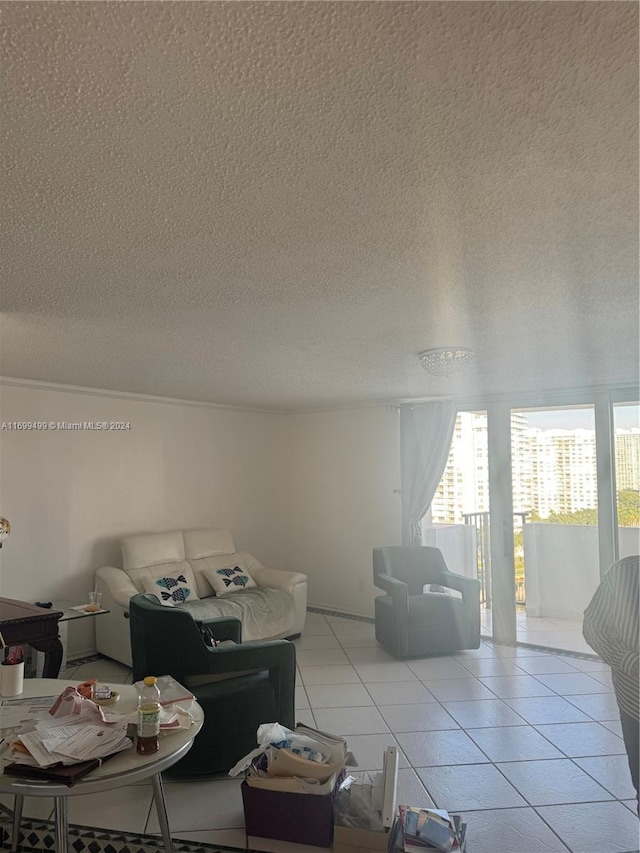 tiled living room with a textured ceiling