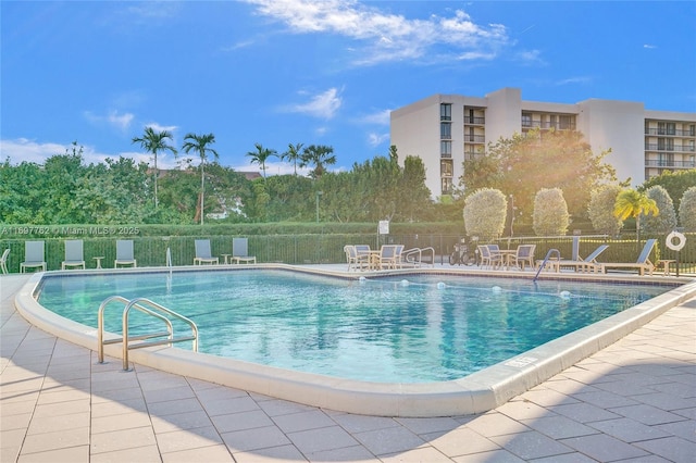 view of pool featuring a patio