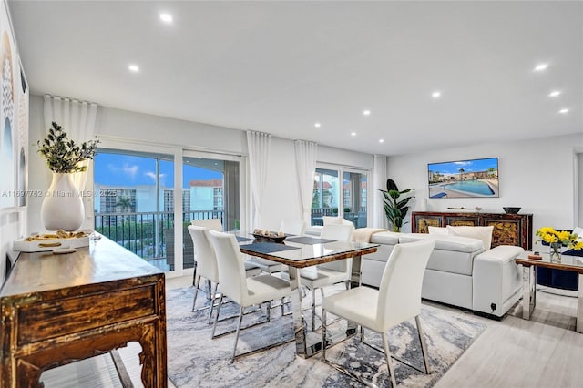 dining area with light hardwood / wood-style flooring