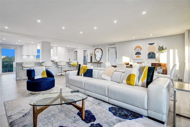 living room with light hardwood / wood-style floors